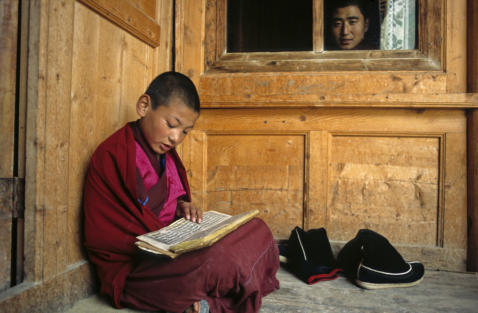The novice and his tutor, Labrang Monastery - Gyarong - Eastern Tibet - China 2004 - analogic photo